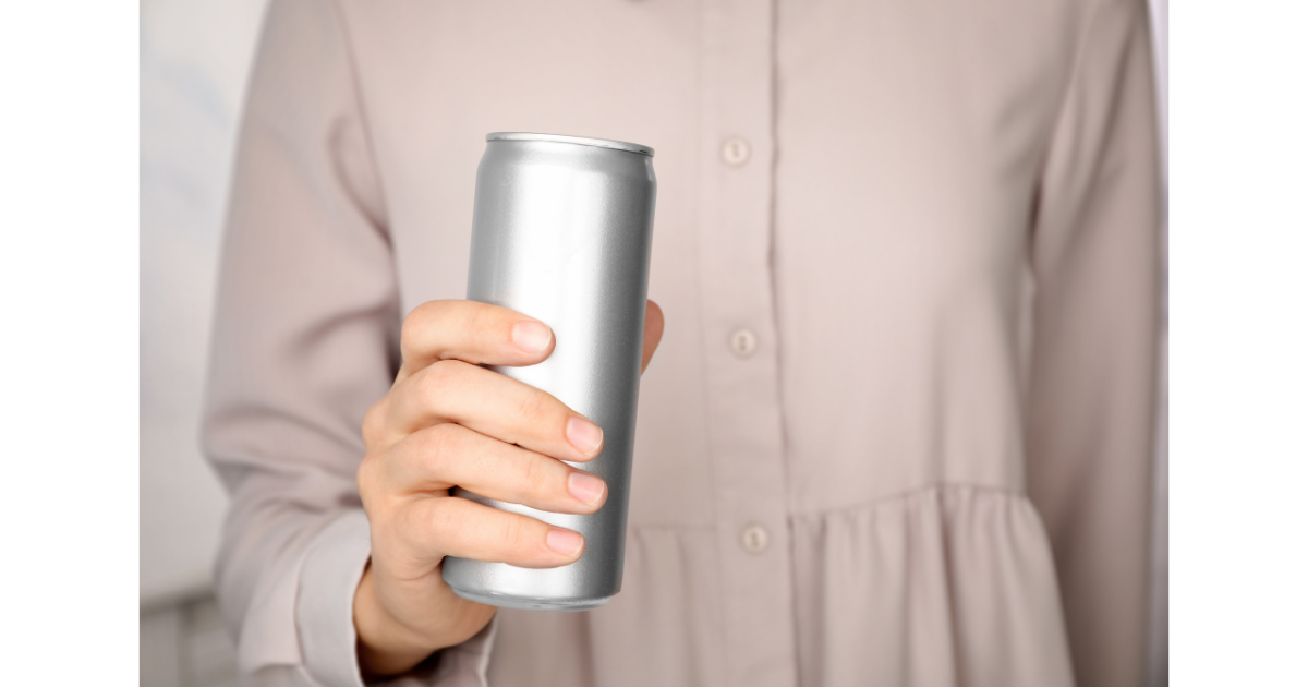 A person holding a blank aluminum beverage can